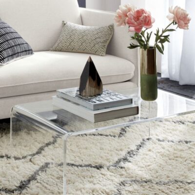 CB2 Peekaboo Acrylic Coffee Table for visually open small living rooms