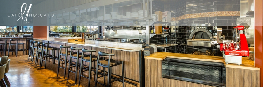 The Cafe Mercato logo sits in the upper left hand corner of an image of the restaurant.