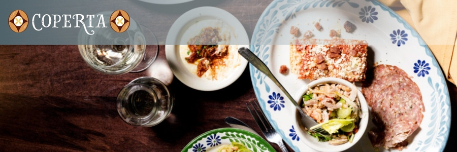 The Coperta logo sits in the upper left-hand corner of an image of several Italian dishes from the restaurant.