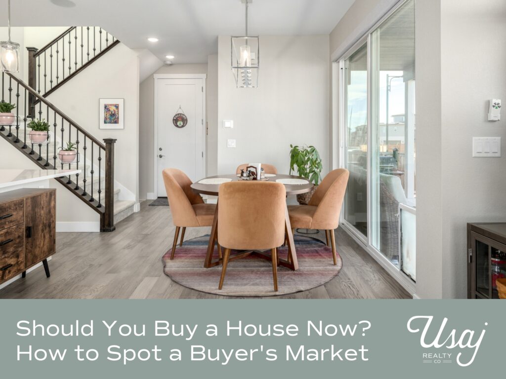 A photo of a updated dining area sits above white text on a gray backround that reads, "Should You Buy a House Now? How to Spot a Buyer's Market" next to the Usaj Realty logo in white