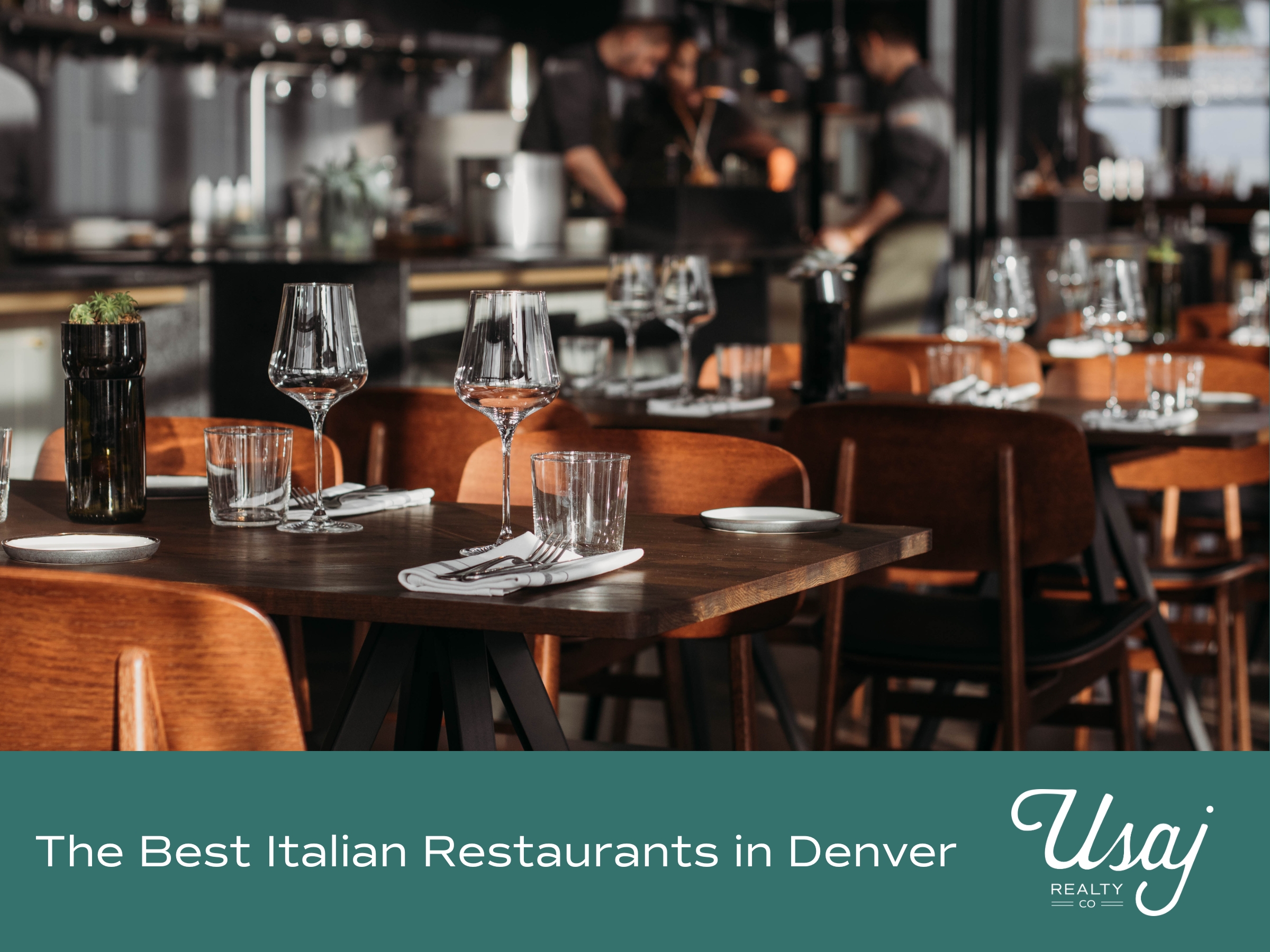 A stylized camera shot of an Italian restaurant with place settings on the table and the employees in the background sits above white text on a teal background that reads, "The Best Italian Restaurants in Denver" to the left of the Usaj Realty logo.