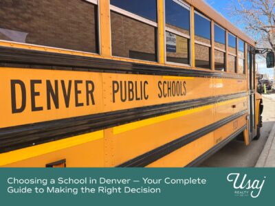 A photo of a yellow school bus with "Denver Public Schools" printed on the side rests above white text on a teal background that reads, "Choosing a School in Denver — Your Complete Guide to Making the Right Decision" next to the Usaj Realty CO logo in white.