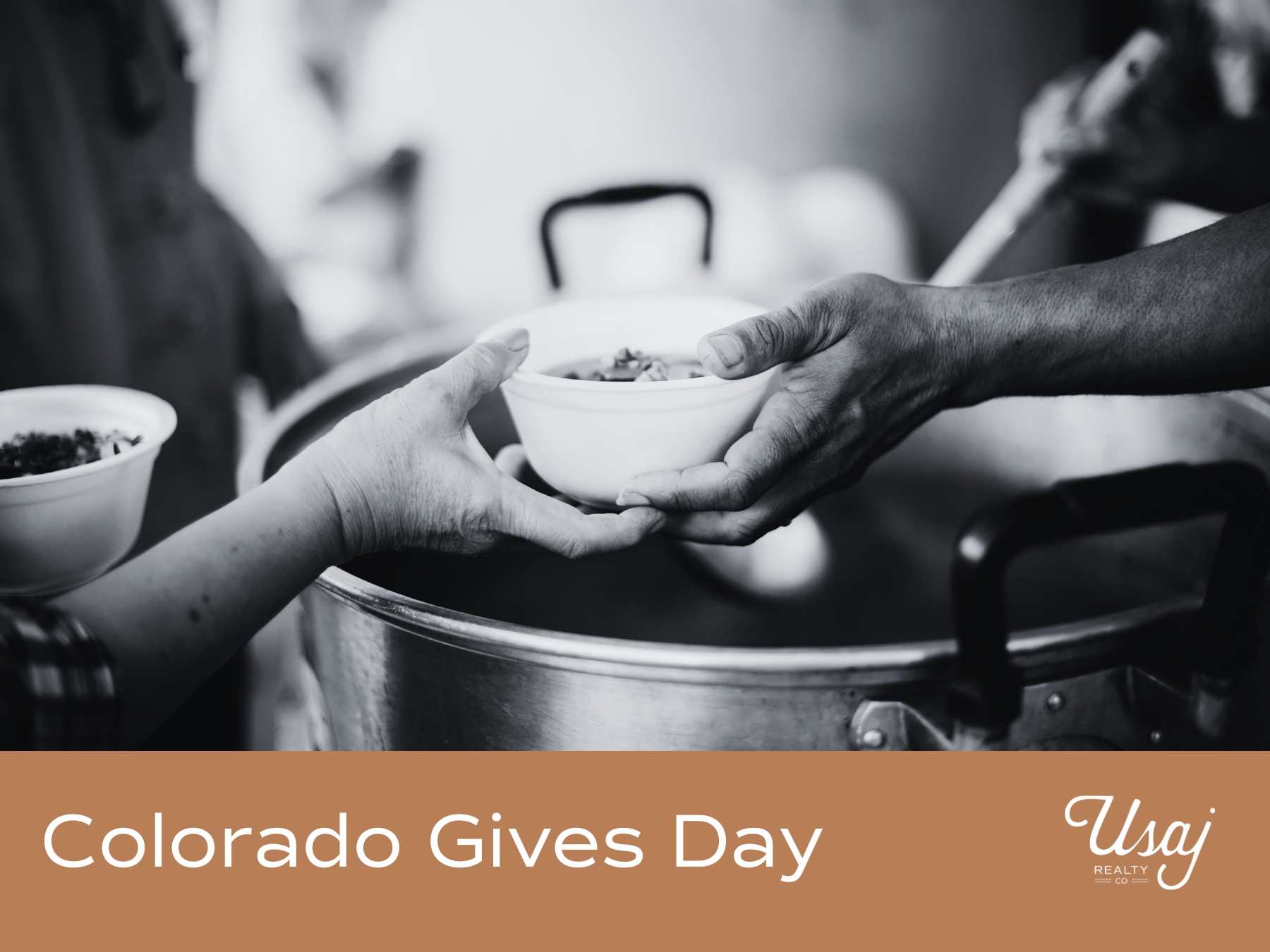A black and white photo features someone dishing up a soup and handing it to another person. Below, white text on an orange background reads, "Colorado Gives Day" next to the Usaj Realty logo in white.