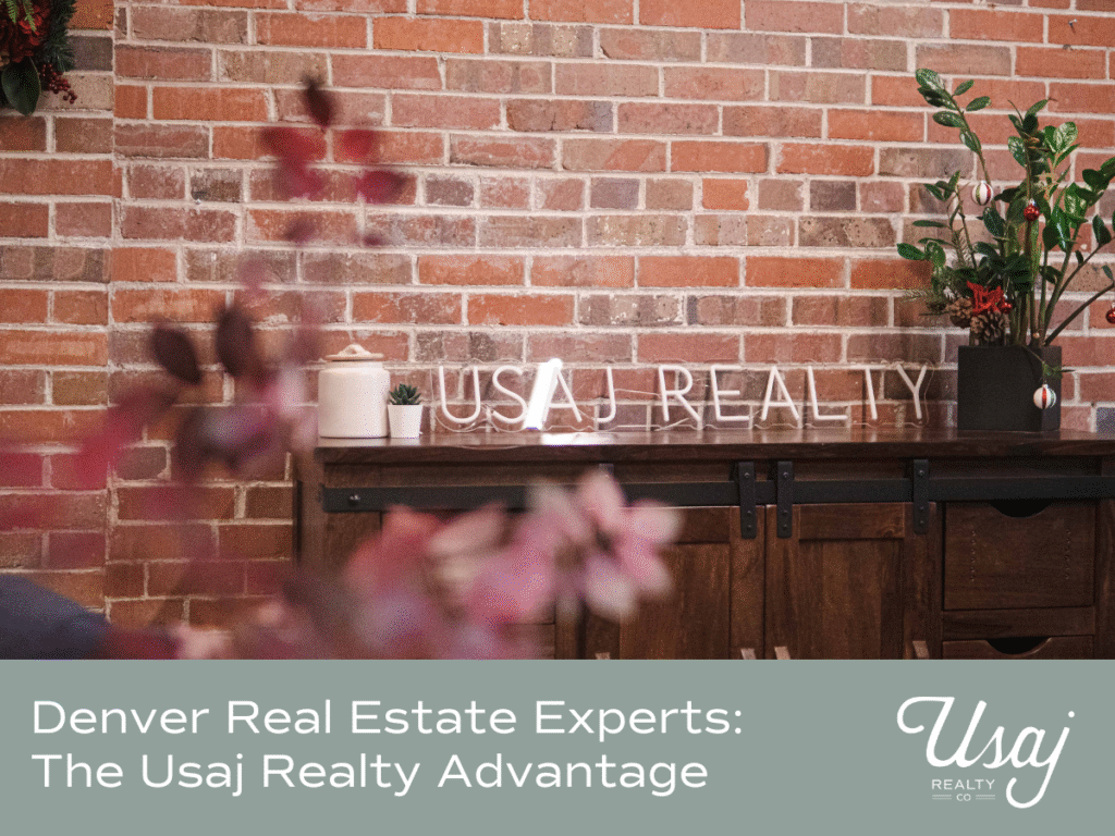 An interior photo of the Usaj realty office showcasing a neon sign with the company name on a credenza. White text on a light gray background reads, :Denver Real Estate Experts: The Usaj Realty Advantage"
